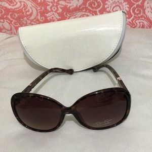 Sun glasses. With case. 100% UV protective.